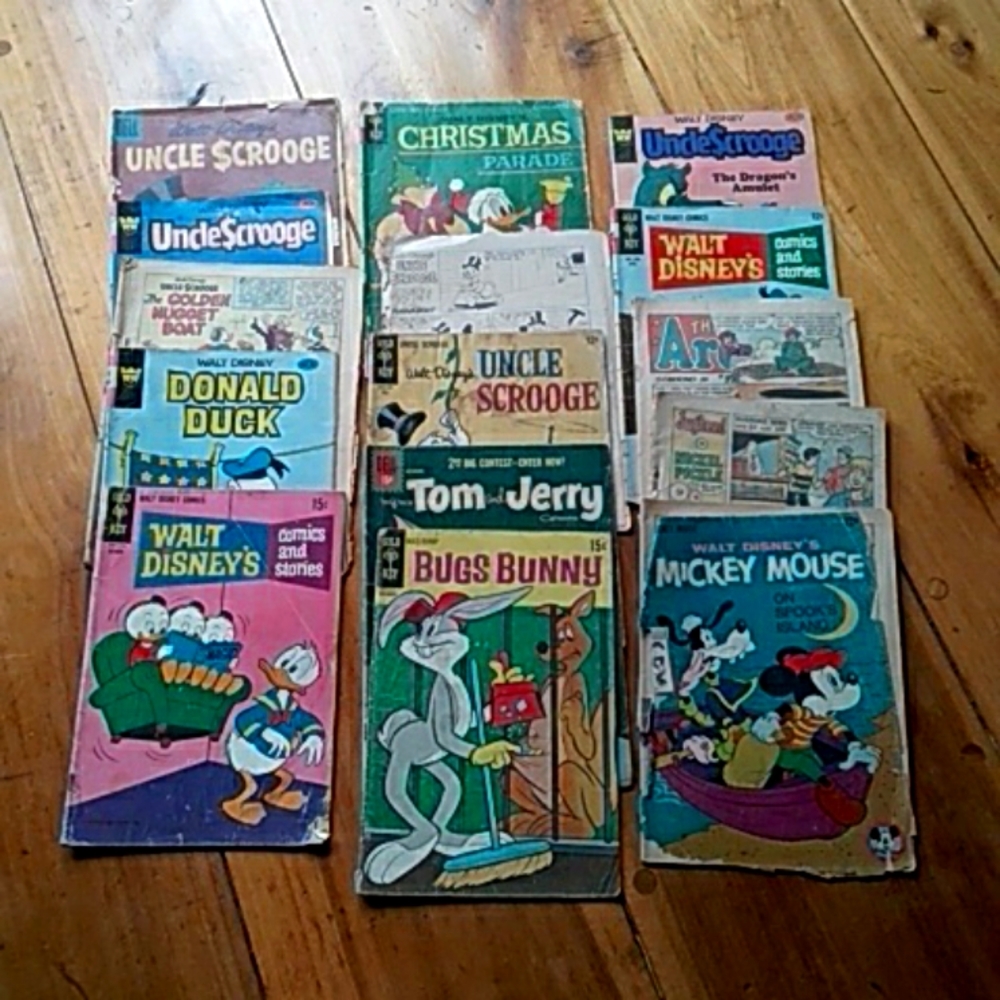 Lot of 15 vintage Walt Disney comic books.